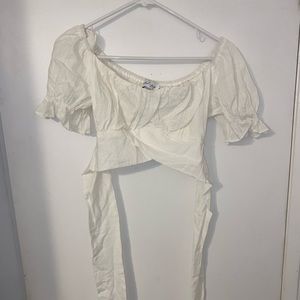 White crop top with tie back . Size medium